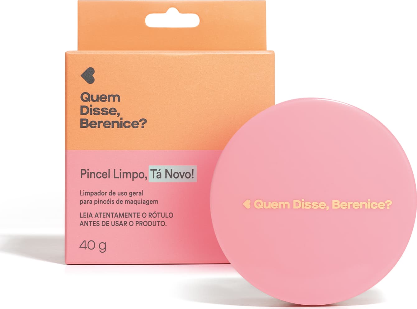 Umagem de um pote com tampa rosa em formato circular de limpador de pincéis da marca Quem Disse, Berenice?, com texto "Pincel Limpo, Tá Novo!" e informações sobre o produto. Ao lado está sua caixa na cor rosa e laranja com letras pretas.