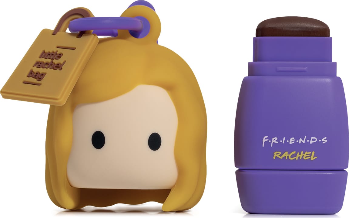 Batom com embalagem roxa escrito "Friends Rachel". Ao Lado, tampa em forma de boneca.