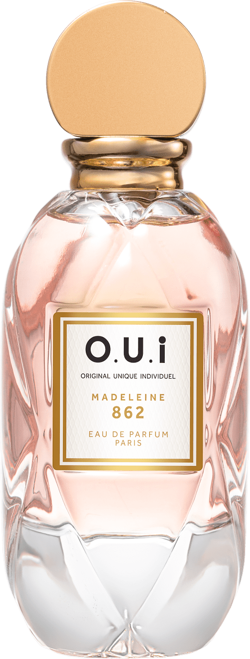 Frasco de perfume O.U.i. Madeleine 862, com embalagem de vidro rosa e detalhes dourados, rótulo com nome da fragrância e informações sobre a marca.