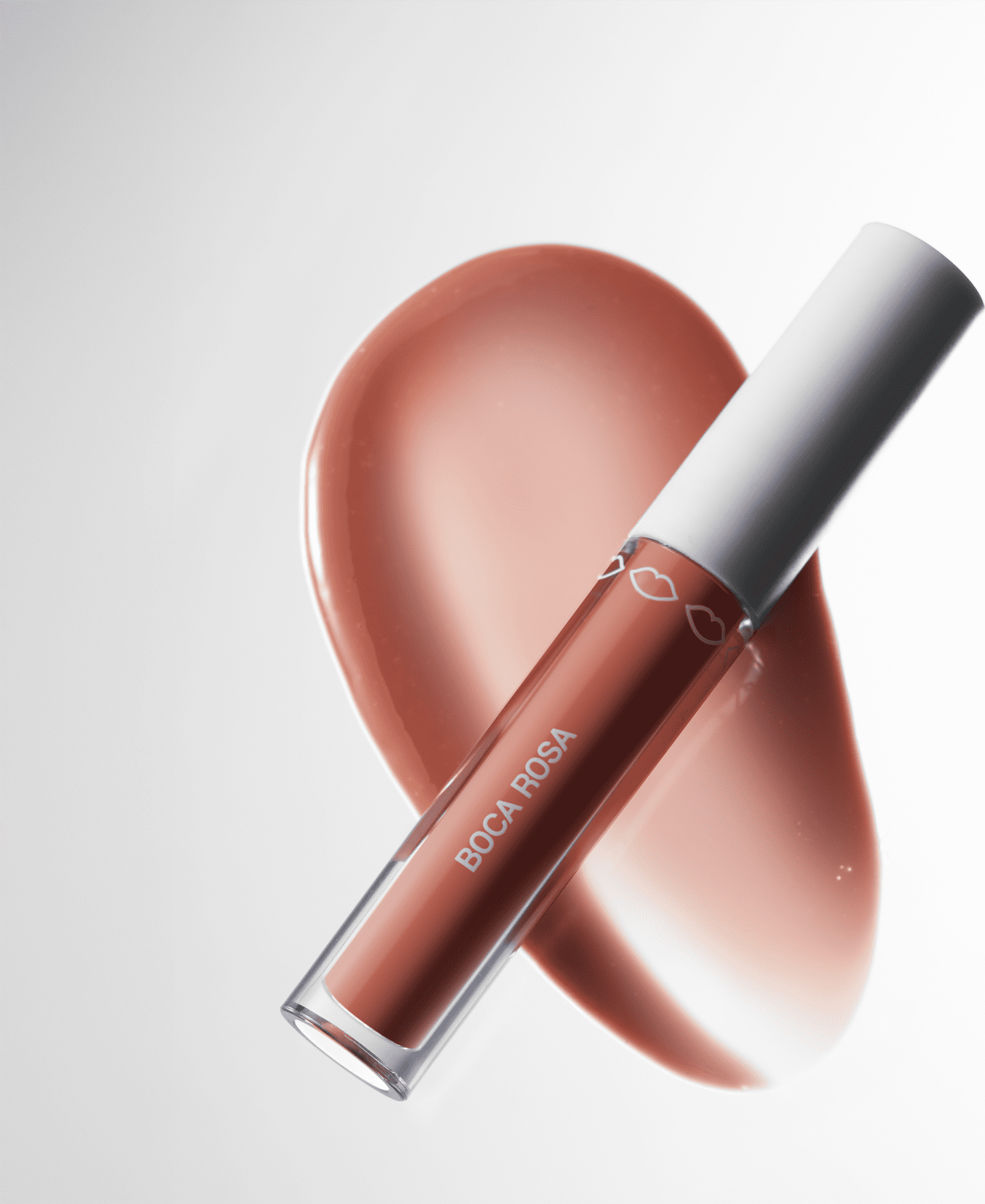 A imagem mostra o Gloss Boca Rosa Hidra Lábios Bege Translúcido e a cor e textura ao fundo