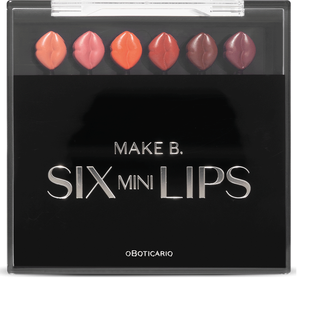 A imagem mostra uma paleta de maquiagem da marca Make B. chamada "Six Mini Lips". É uma embalagem retangular preta com seis batons em formato de gota, dispostos em duas fileiras. Os batons apresentam tons variados de rosa, coral e vinho.