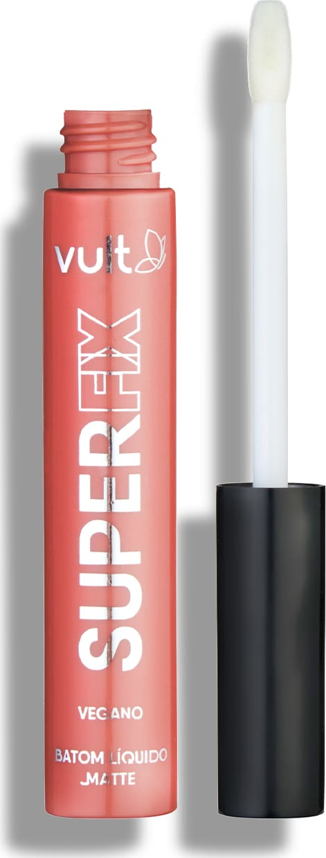 O produto apresentado é um batom líquido matte da marca Vult, na cor castanho. A embalagem é um tubo plástico castanho com o nome da marca e do produto visíveis. O aplicador é branco e alongado, típico de batons líquidos.
