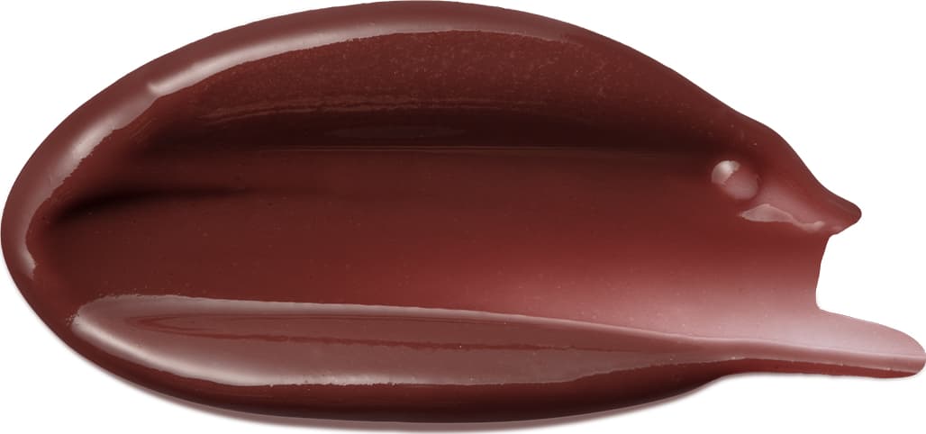 Imagem da textura cremosa e brilhante do hidratante labia, com tonalidade marrom avermelhada característica de produtos Vult. Apresenta consistência suave e uniforme, indicando uma fórmula de alta qualidade.