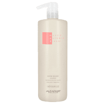 A imagem mostra o Shampoo Blonde Rescue de 1 litro da marca MAB Marco Antônio de Biaggi by Alfaparf Milano. O frasco plástico é cilíndrico, branco e vem com bomba dosadora. O rótulo tem detalhes do produto em letras pretas e o logotipo da marca em rosa.