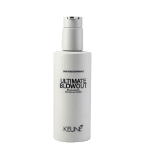 A imagem mostra o produto Ultimate Blowout, da marca Keune. Embalagem plástica bege opaca com pump dosador. Rótulo com o texto "ULTIMATE BLOWOUT Blowdry volumizer Volumisateur pour brushing" em letras pretas maiúsculas.