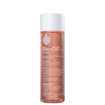 Frasco de 125ml do produto Bio-Oil, com rótulo branco e laranja, contendo informações sobre os benefícios do óleo para a pele, como cicatrizes, estrias e tons de pele desiguais.