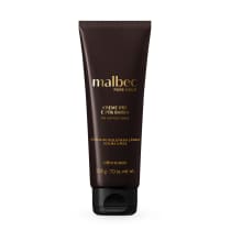 Tubo de creme pré e pós-barba da marca Malbec Pure Gold, com embalagem marrom escura e detalhes em dourado. Produto com 200g, indicado para auxiliar no deslizar da lâmina e acalmar a pele.
