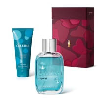 Celebre Agora, um kit de produtos de beleza composto por um frasco de fragrância de vidro azul-turquesa e um tubo de gel de banho e corpo azul-turquesa, embalados em uma caixa vermelha com um padrão abstrato.