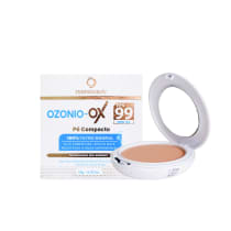 Pó compacto Ozonio-Ox da Cosmobeauty, com filtro mineral, alta cobertura e efeito mate. Embalagem branca e dourada, com informações sobre a tecnologia bio-energy e proteção solar FPS 99.