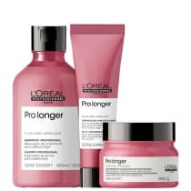 A imagem mostra um kit da L'Oréal Professionnel Pro Longer com um frasco arredondado de shampoo, uma bisnaga de leave-in e um pote arredondado de máscara. Todos de cor rosa escuro, rótulo branco e tampa preta.