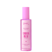 Spray perfume mist, com frasco em formato cilíndrico e cor rosa. No rótulo, está escrito "Urban Beat".