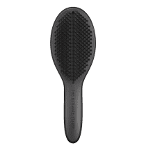 Escova The Ultimate Styler, da marca Tangle Teezer. Cor preta.