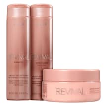 Três produtos da linha Revival da marca Braé: um frasco de shampoo, um frasco de condicionador e um pote de máscara, todos em embalagens rosadas com detalhes em texto branco.