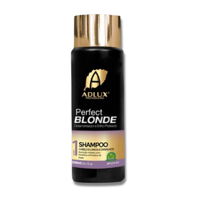 Shampoo da linha "Perfect Blonde" da marca Adlux Professional. A embalagem é um frasco preto com um rótulo dourado, contendo 300ml do produto. O rótulo exibe o nome da linha "Perfect Blonde" e indica que o shampoo é destinado a cabelos loiros e grisalhos.