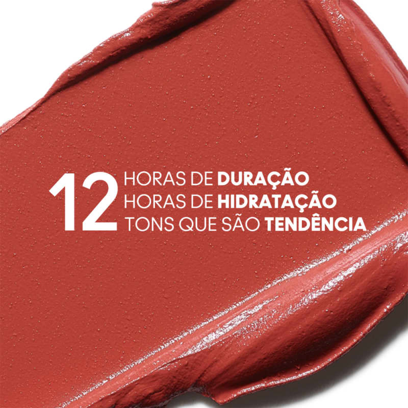 A imagem mostra um pouco do produto espalhado em um fundo branco com informações escrito em branco, em cima do produto, sobre as 12 horas de duração, hidratação e 12 tons da coleção.