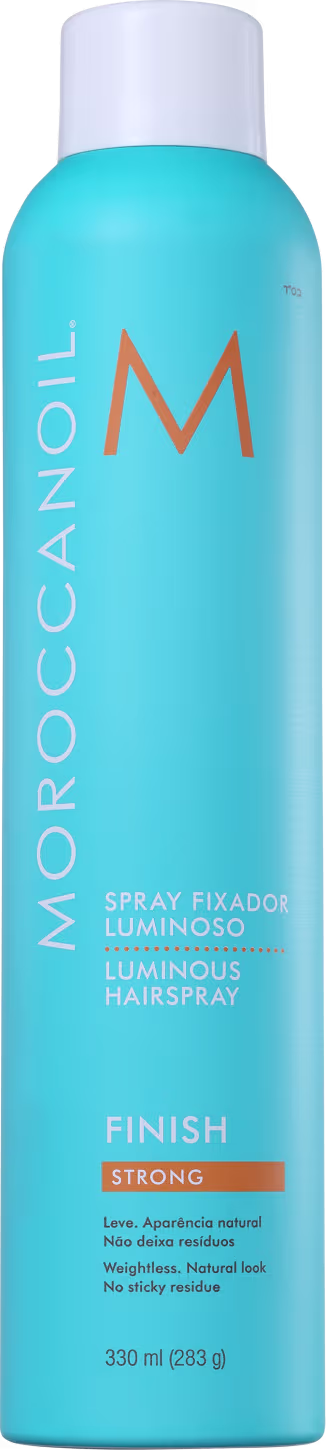 A imagem mostra o Spray Fixador Moroccanoil Finish Luminous Strong 330ml, com embalagem cilíndrica azul claro com tampa branca. Traz a letra M em laranja e texto em letras brancas e pretas.