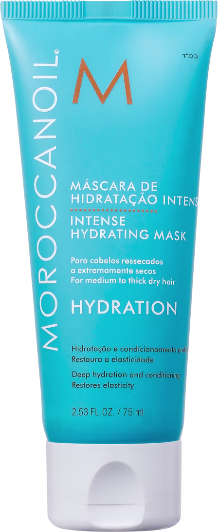 Tubo azul da Moroccanoil contendo máscara de hidratação intensa para cabelos médios a grossos. Rótulo com logotipo da marca e informações sobre o produto em inglês.