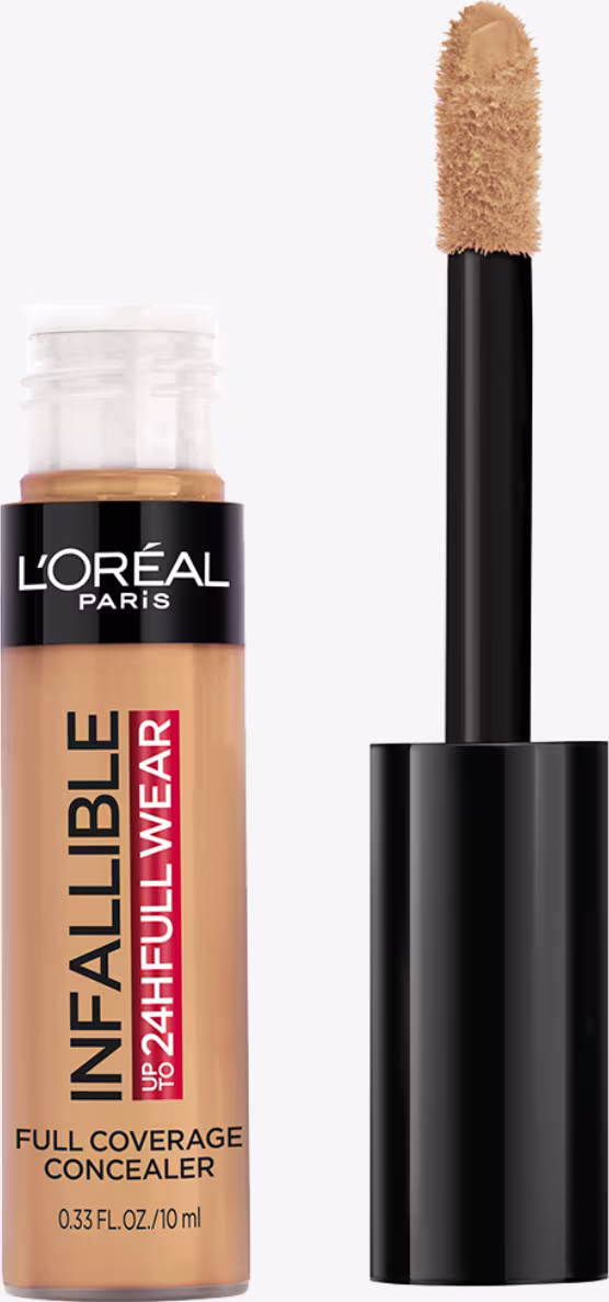 O produto é um Infallible Full Coverage Concealer da L'Oréal Paris, em um frasco preto com rótulo preto e dourado. O aplicador é um pincel de cerdas macias. O produto é destinado a oferecer cobertura completa.