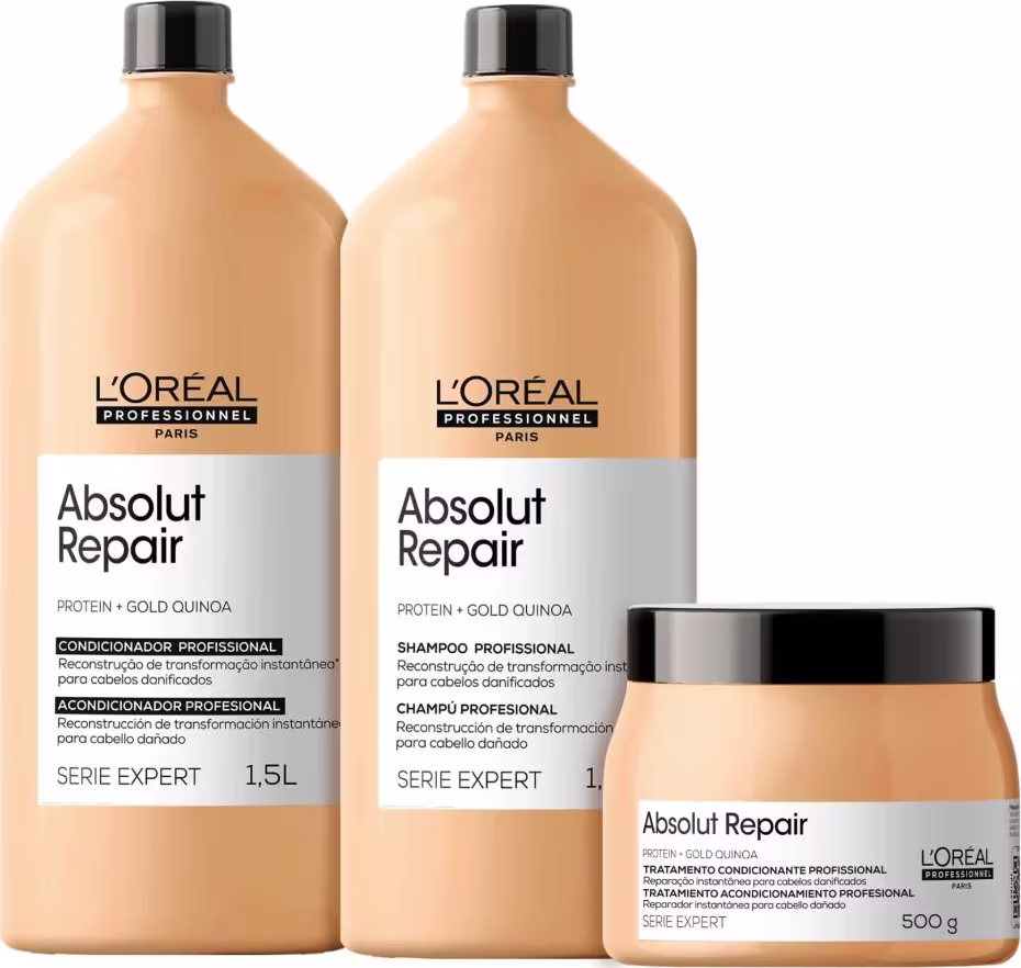 Produtos de tratamento capilar da linha Absolut Repair da L'Oréal Professionnel. Dois frascos plásticos grandes de 1,5 litros na cor bege, um contendo shampoo e outro condicionador. Um pote plástico menor de 500g na mesma cor bege.