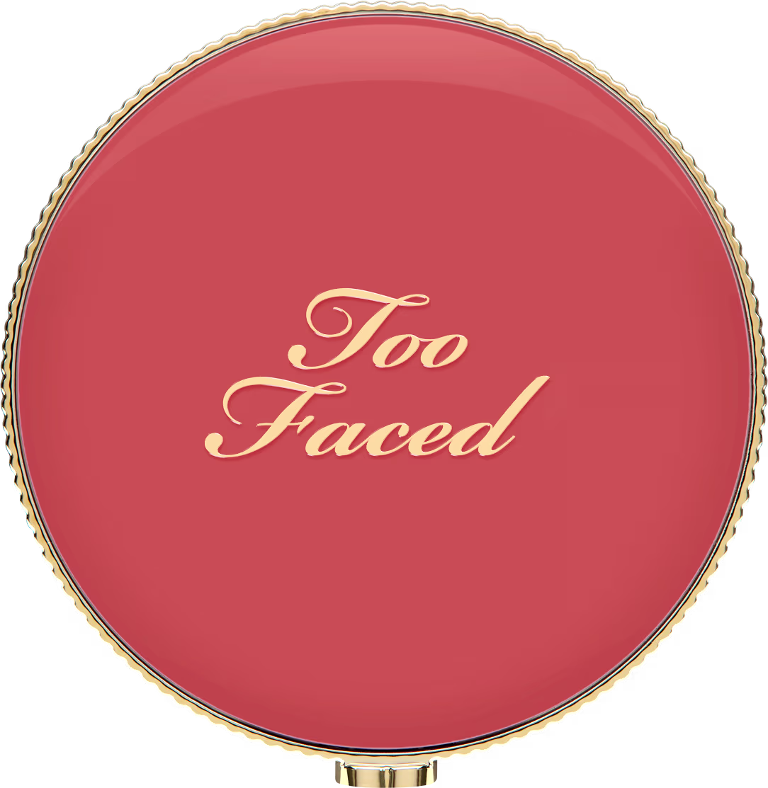 Blush fechado visto de cima. Detalhes rosa e dourados em foco.