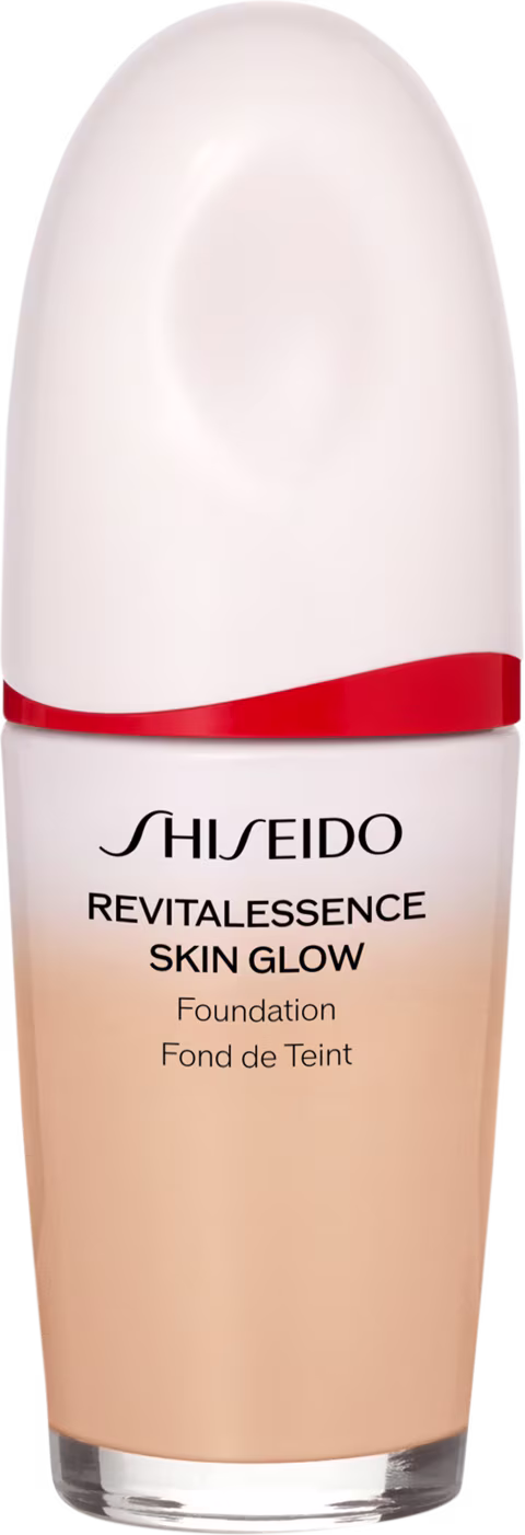 Base facial da marca Shiseido., Embalagem em forma de frasco plástico oval com uma faixa vermelha na parte superior. Rótulo indicando "Revitalessence Skin Glow Foundation" em letras pretas.