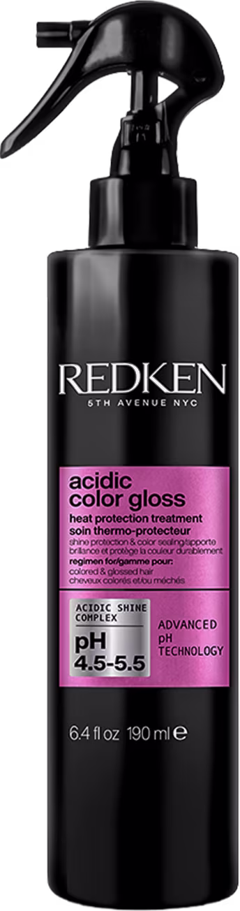 Frasco preto com rótulo rosa da marca Redken contendo tratamento para proteção da cor dos cabelos, com tecnologia avançada de pH.