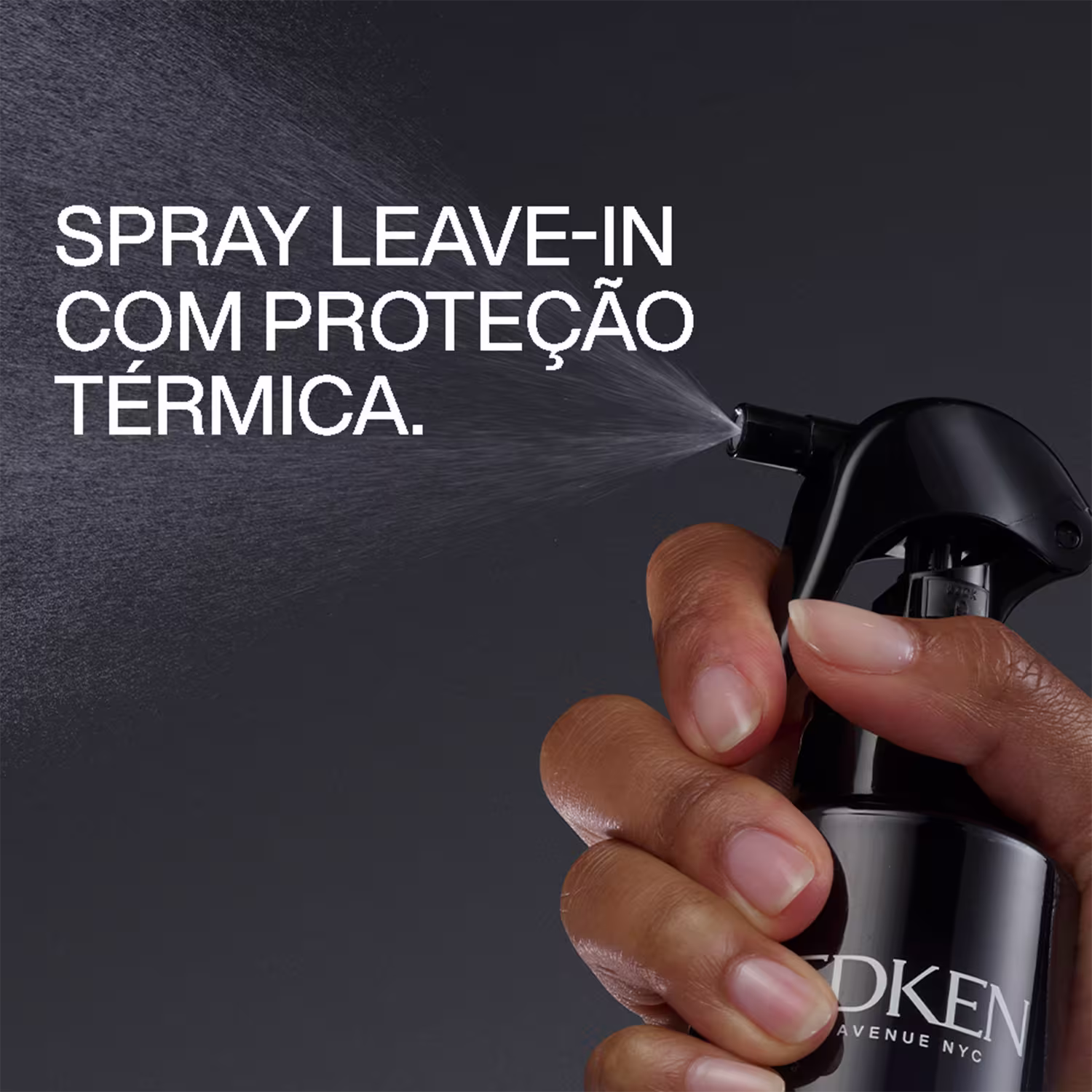 Spray leave-in com proteção térmica da marca Redken em embalagem preta com texto em branco.