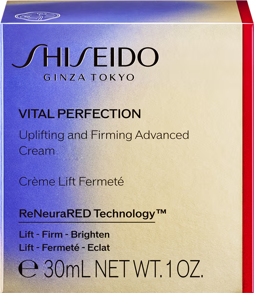 Embalagem azul e dourada da linha Vital Perfection da marca de cosméticos Shiseido. Na parte frontal, o logotipo Shiseido e o nome do produto "Vital Perfection Uplifting and Firming Advanced Cream"