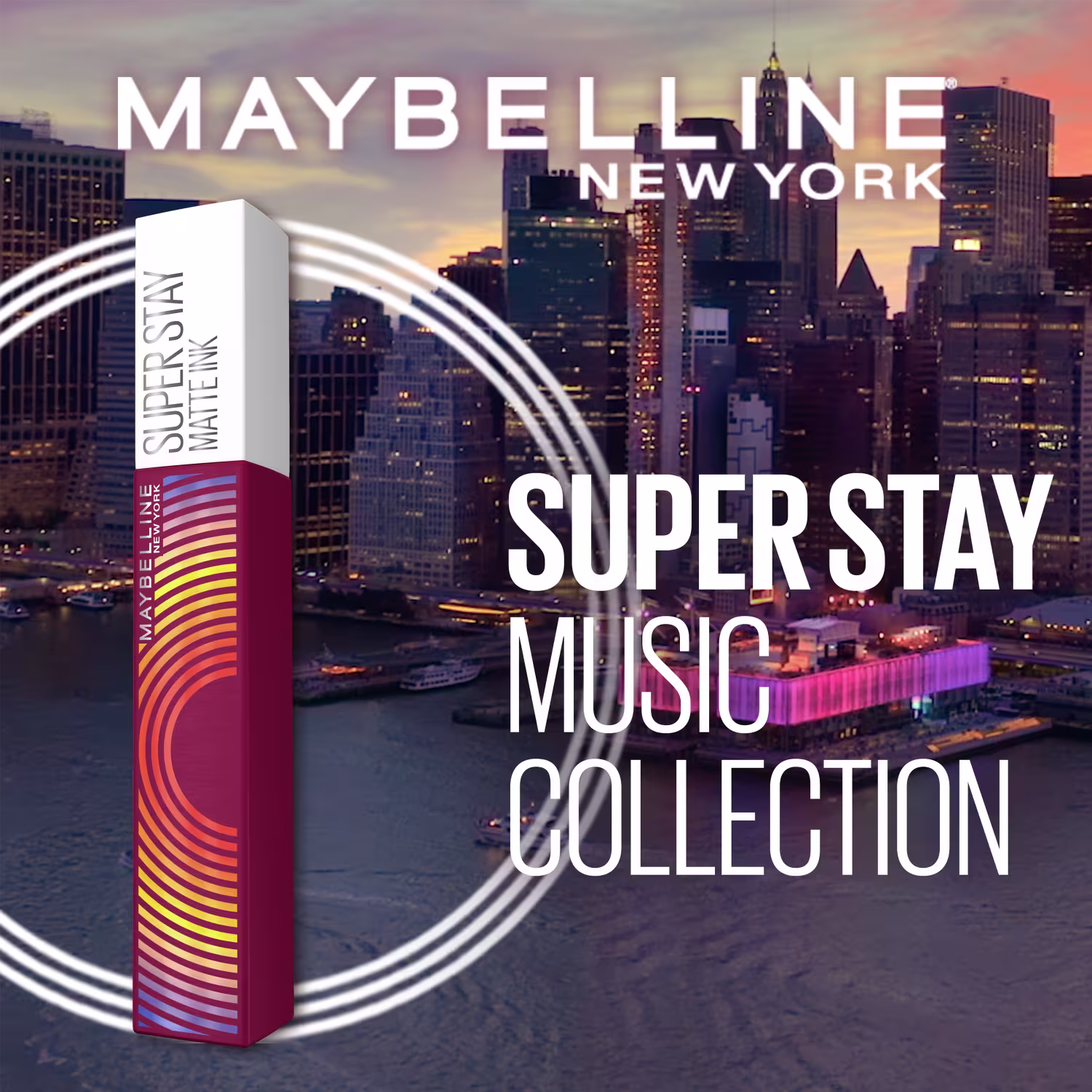 Esta é uma coleção chamada "Super Stay Music Collection". O batom é apresentado como uma caixa retangular vermelha com listras amarelas e brancas em um design ondulado. A embalagem aparece a frente dos arranha-céus iluminados de Nova York.