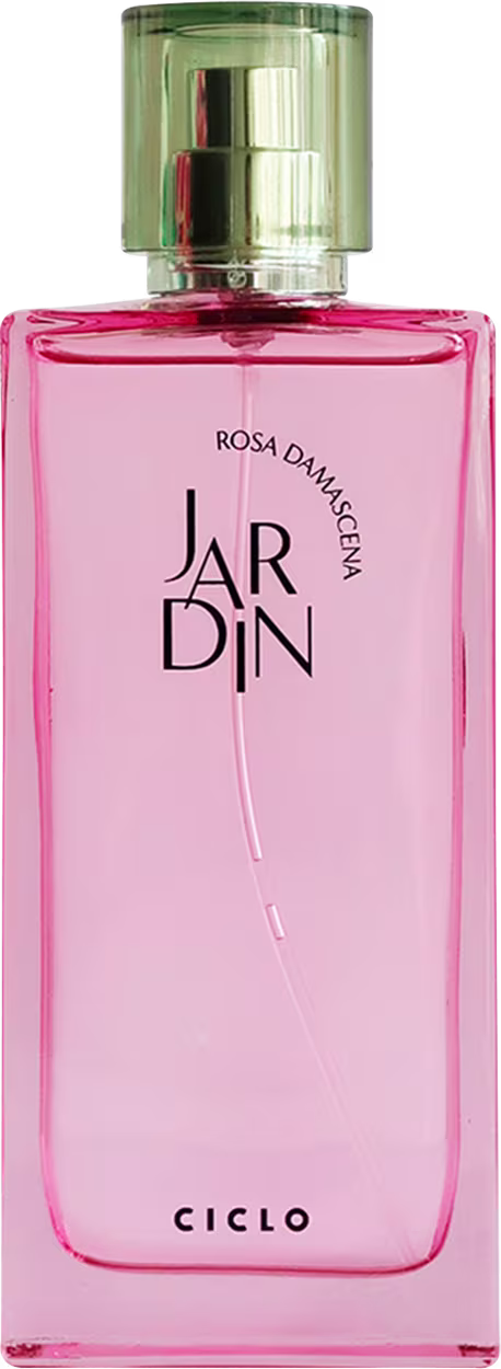 Perfume em frasco retangular de vidro transparente com líquido rosa. A embalagem apresenta o nome "JARDIN" em letras maiúsculas pretas e "Rosa Damascena" em letras menores abaixo. Na parte inferior, está escrito "CICLO" em letras maiúsculas pretas.
