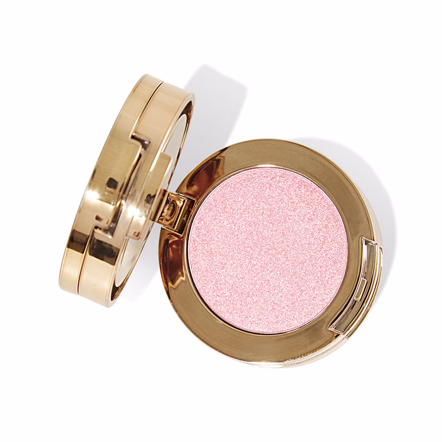 Visão de cima da cor número 2 da paleta, que tem uma cor rosa pálido com acabamento perolado. A embalagem metálica apresenta um design sofisticado e elegante.