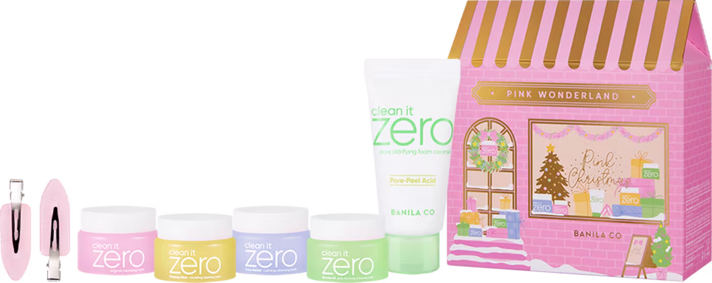 Duas presilhas de cabelo, 4 potes de balm de limpeza, uma espuma de limpeza e uma embalagem em formato de casinha colorida e natalina na cor rosa.