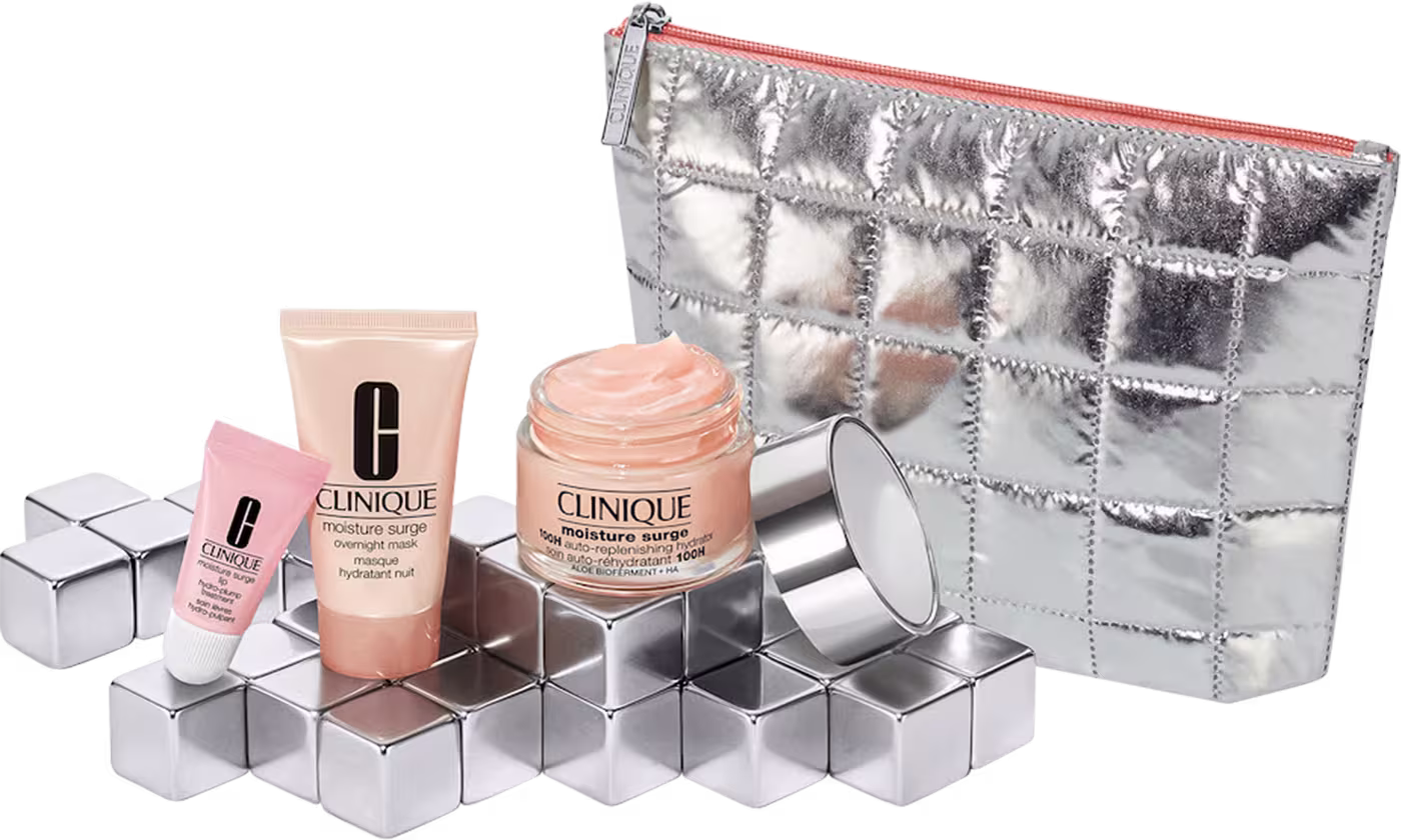 A imagem mostra um kit com 3 produtos de cuidados faciais, além de um nécessaire prata.