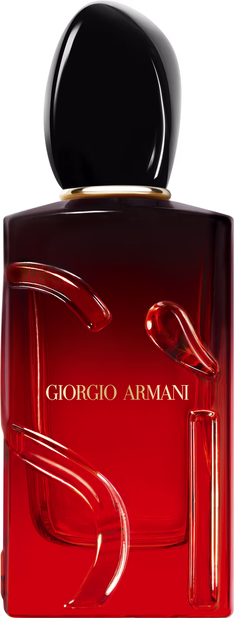 O frasco possui um formato retangular com uma tampa oval, com a marca "Giorgio Armani" impressa em destaque. A cor predominante é o vermelho escuro, com um acabamento brilhante.