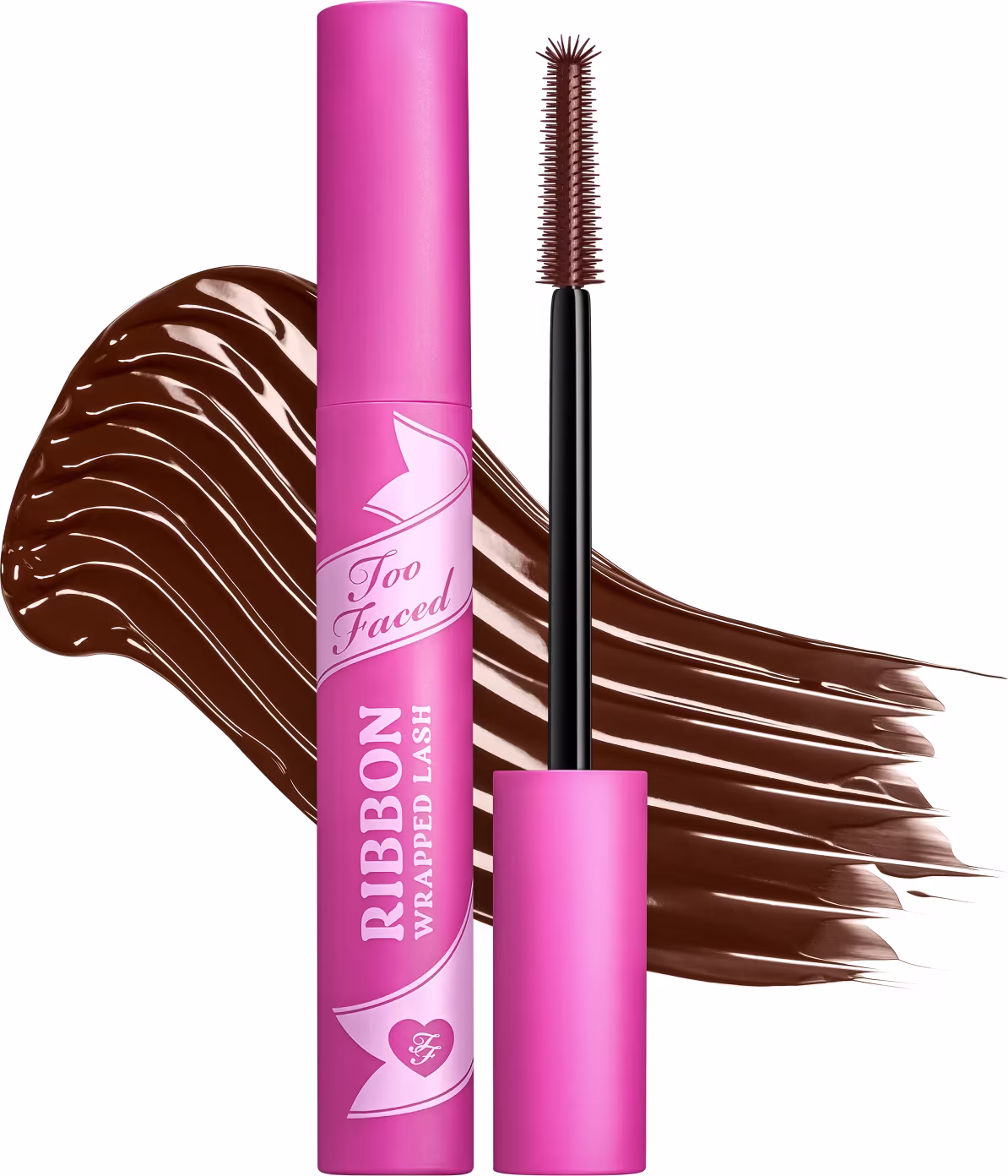 Embalagem rosa com logotipo da marca Too Faced, contendo uma máscara de cílios de cor marrom em formato cilíndrico. O produto é chamado de "Ribbon Wrapped Lash" e possui uma escova de cerdas marrons para aplicação.