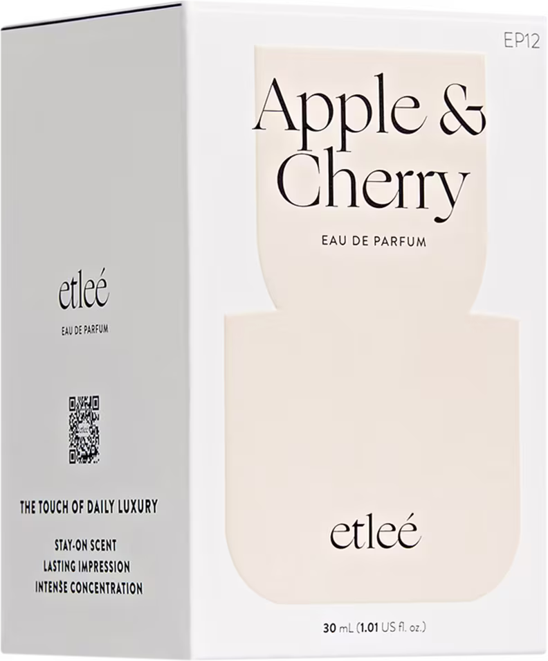 Caixa branca retangular do perfume Etleé com rótulo "Apple & Cherry Eau de Parfum". Texto em preto destaca o nome do produto e a marca.