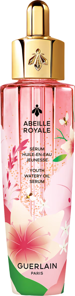 Frasco de vidro rosa com tampa dourada contendo o sérum "Abeille Royale" da Guerlain, com detalhes florais e texto em francês descrevendo o produto como um sérum de óleo aquoso para juventude.