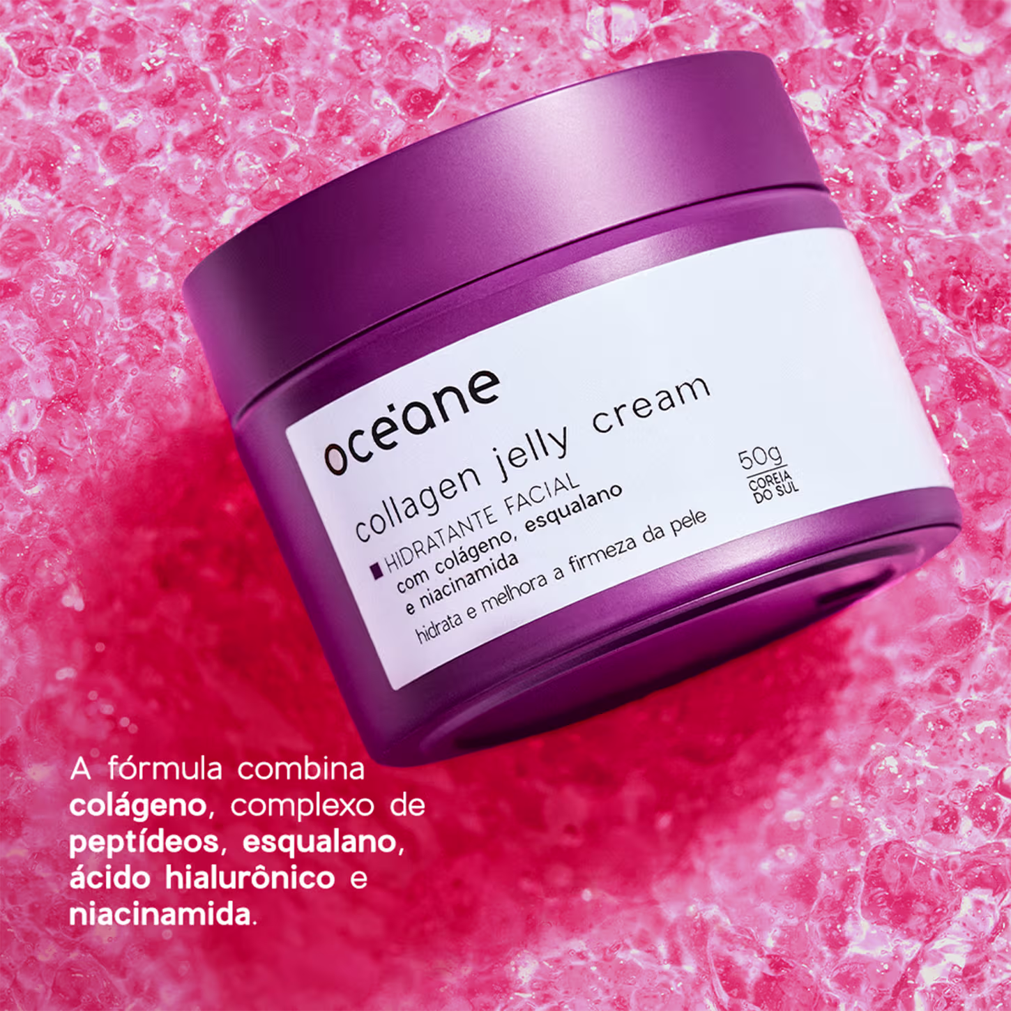 Um pote de creme facial da marca Océane em fundo rosa com cristais de gelo, destacando a embalagem com informações sobre os ingredientes e benefícios do produto.