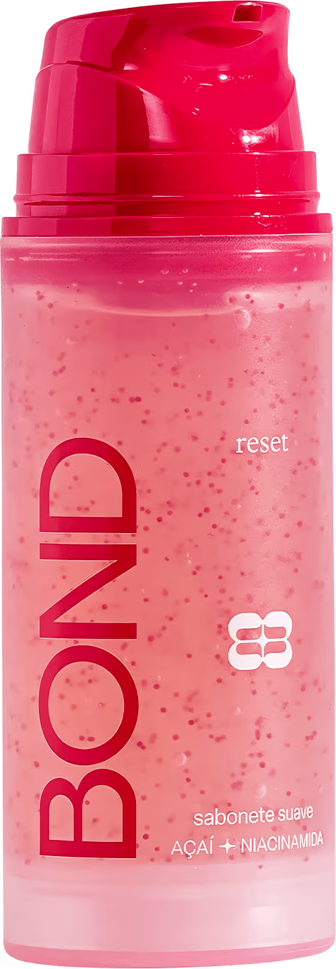 Frasco plástico rosa com tampa vermelha contendo sabonete líquido da marca Bond Rio com ingredientes de açaí e niacinamida, com texto "reset" visível no rótulo.