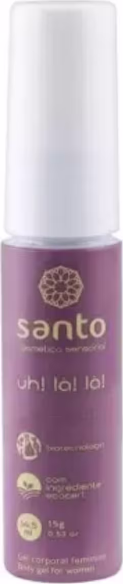 Santo Cosméticos. Frasco cilíndrico contendo rótulo de cor roxa com o logotipo da marca Santo e o nome do produto impresso. Ícones indicando que é um produto vegano.