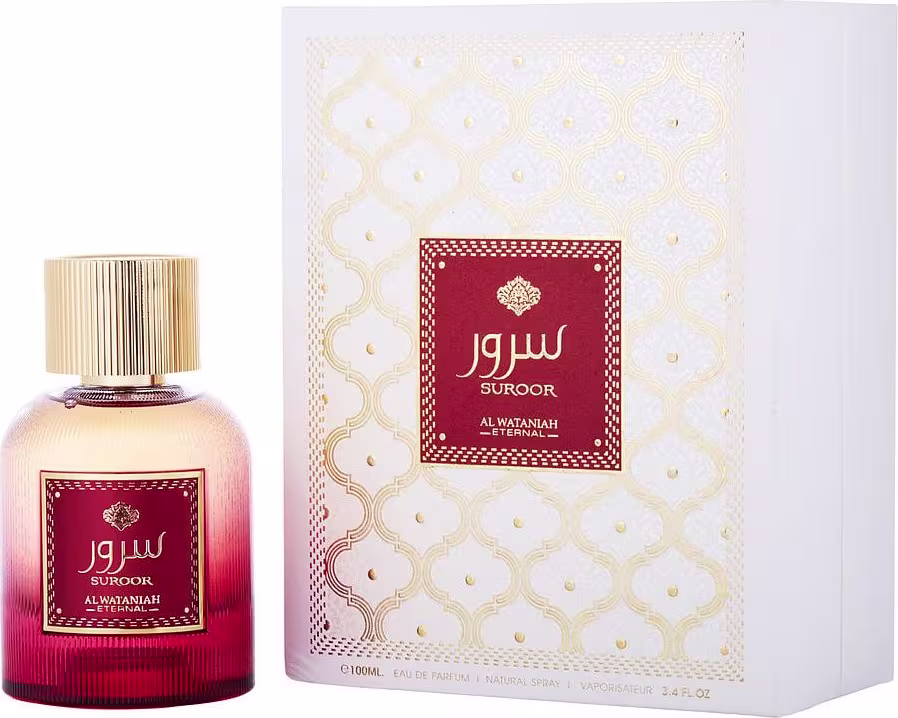 Frasco de perfume Al Wataniah Suroor em embalagem vermelha e dourada, com rótulo destacado em vermelho e texto em árabe. O produto é apresentado em caixa decorativa com padrões florais em tons claros.