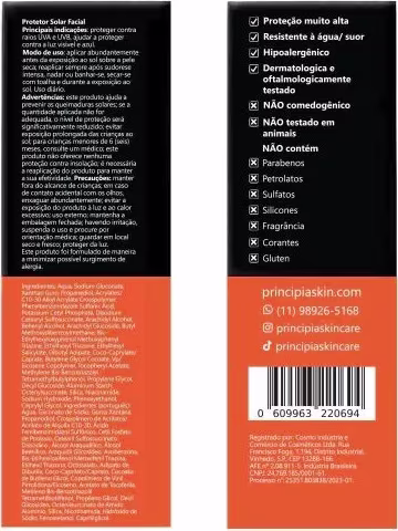 Caixa de produto de beleza com embalagem preta e laranja, contendo informações sobre o produto em português. Apresenta detalhes sobre as características e propriedades do produto, como proteção, resistência e hipoalergênico.