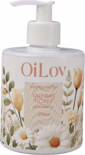 Frasco de sabonete líquido OiLov com design floral, contendo 350ml do produto "Vale das Flores". Embalagem branca com ilustrações de flores e folhas em tons de amarelo e verde.