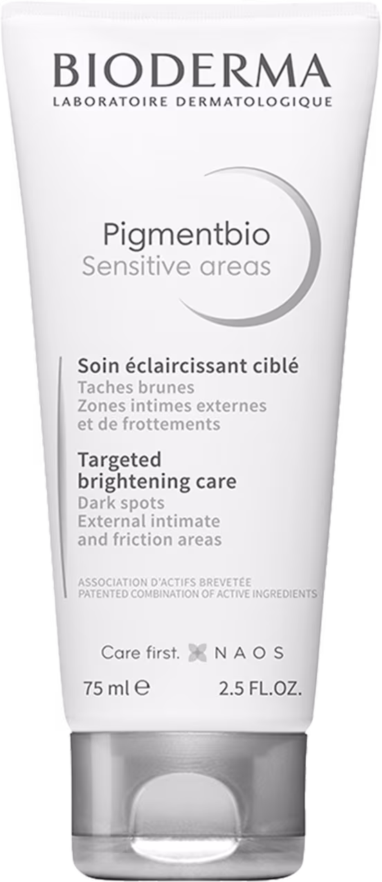 Frasco branco de 75 ml da linha Pigmentbio da Bioderma, com rótulo em preto e cinza indicando "Sensitive areas" e "Targeted brightening care" para áreas escuras e de atrito.