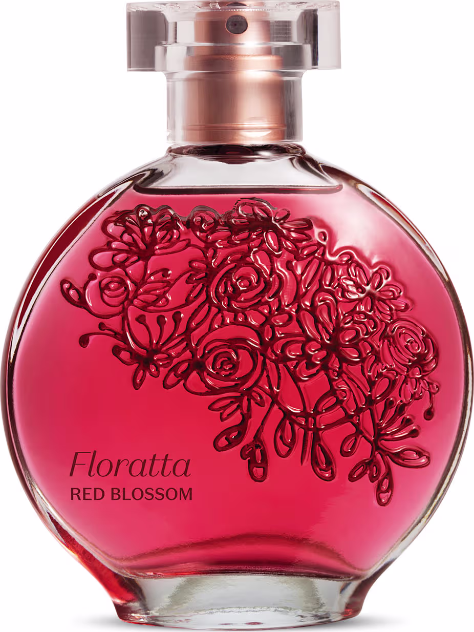 O frasco de vidro tem um formato arredondado e é feito de vidro transparente, com um bocal de metal rosado. O líquido dentro do frasco tem uma cor vermelha vibrante. Na parte frontal do frasco, há um desenho decorativo de rosas vermelhas estilizadas.