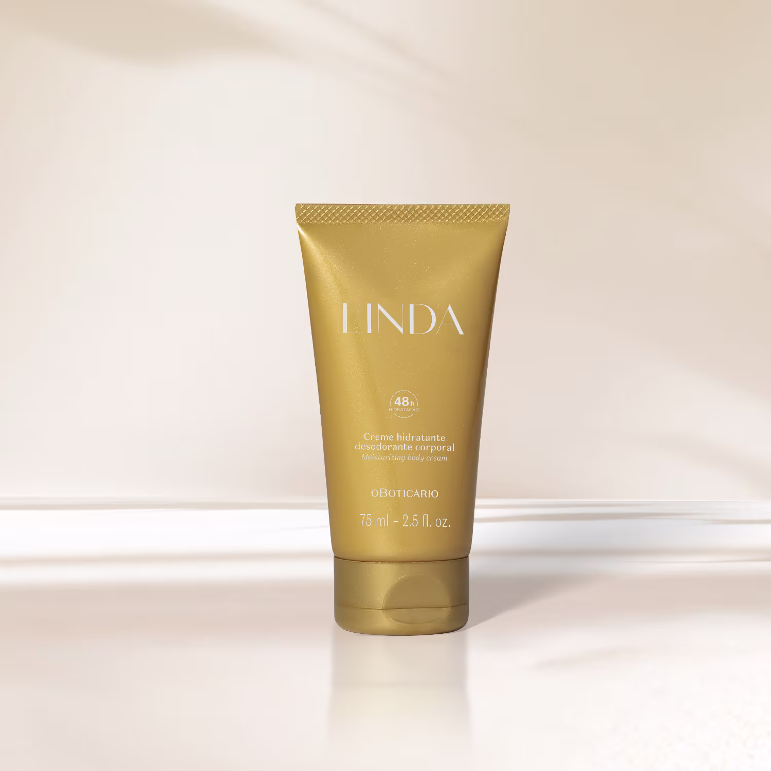 O produto apresentado é um creme hidratante corporal da marca Linda, com embalagem dourada e texto em branco. O rótulo exibe o nome da marca "LINDA" em letras grandes.