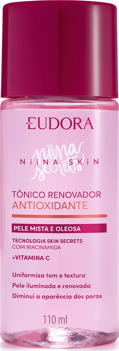 Frasco plástico transparente contendo líquido rosado. Tampa protetora na cor vinho. Embalagem com cores rosa e vinho, típicas da linha. Rótulo transparente com texto em rosa pink, quase vermelhor, e alaranjado. Nome da marca Niina Secrets em branco.