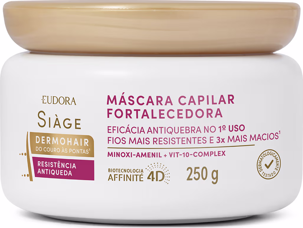 Trata-se de uma máscara capilar fortalecedora em embalagem branca opaca com tampa bege. A embalagem tem formato cilíndrico e contém 250g do produto. Destaca que promete eficácia antiquebra, deixando os fios mais resistentes e 3x mais macios.