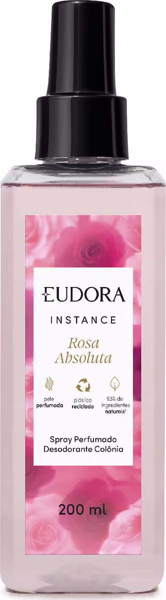 O produto apresentado é um spray perfumado desodorante da linha Instance Rosa Absoluta. O frasco é de plástico transparente com um rótulo rosa, destacando informações sobre o produto. Possui um design elegante e minimalista, com uma tampa preta.