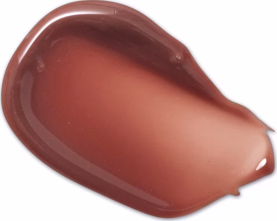Textura de produto de maquiagem com aspecto cremoso, brilhante e translúcido em tom amarronzado.